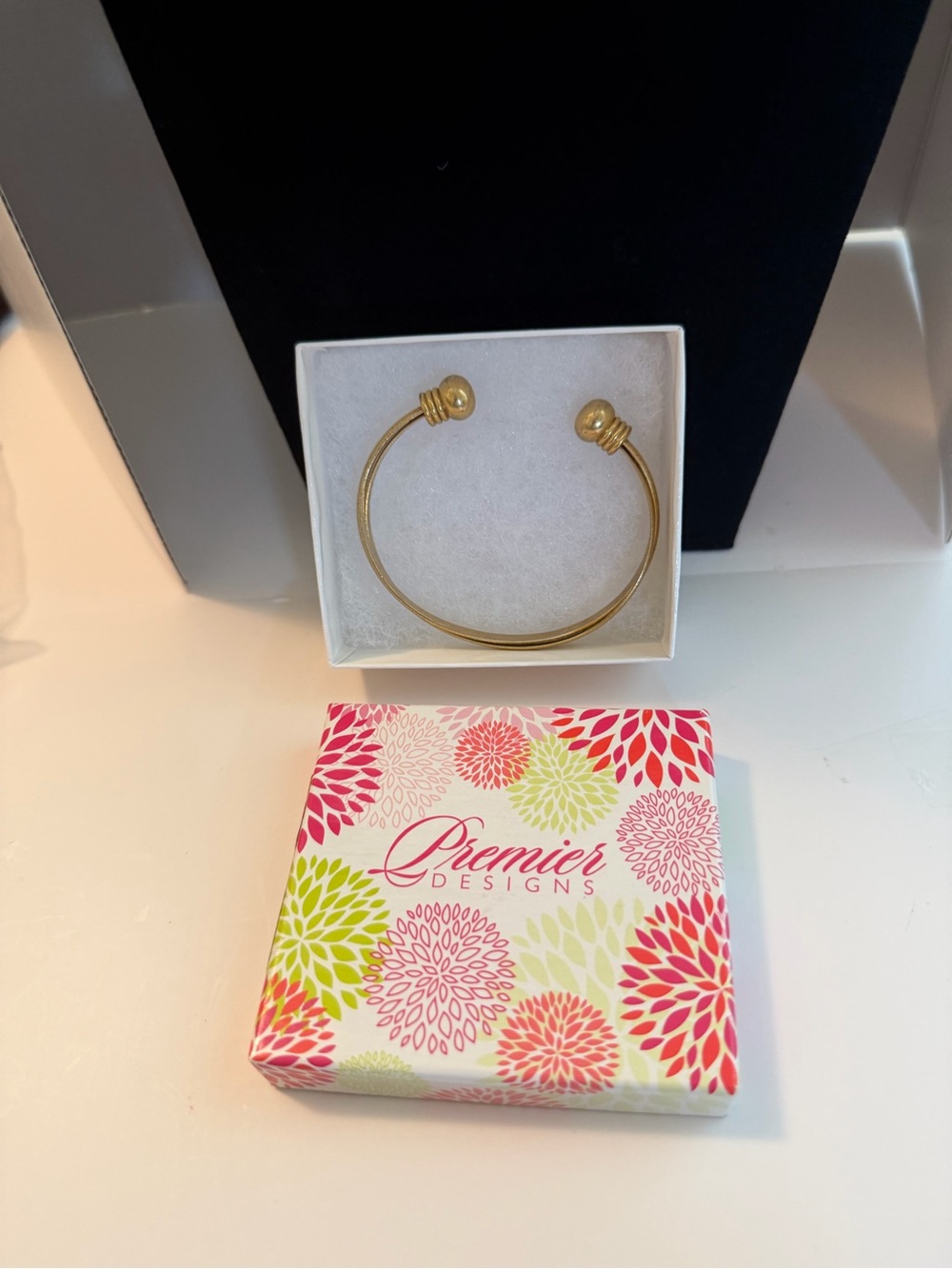 Premier Designs Gold Tone Open Cuff Bracelet with Knotted End Caps